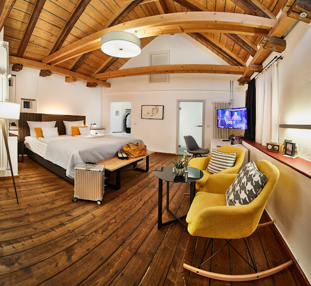 Zimmer Heuboden im Hotel Weinforum Franken – historische Balken, moderner Luxus